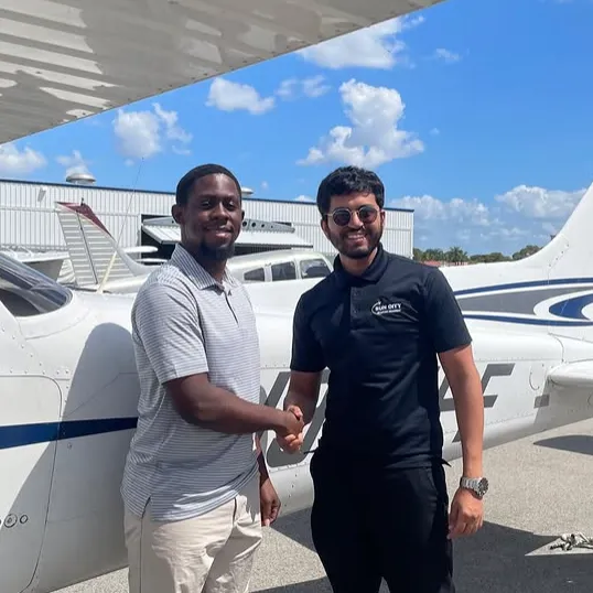 Sun City Aviation Academy student shaking hands with a flight instructor