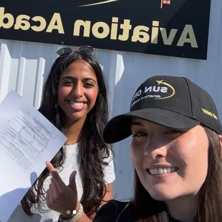 Sun City Aviation Academy female instructor taking a selfie with a student