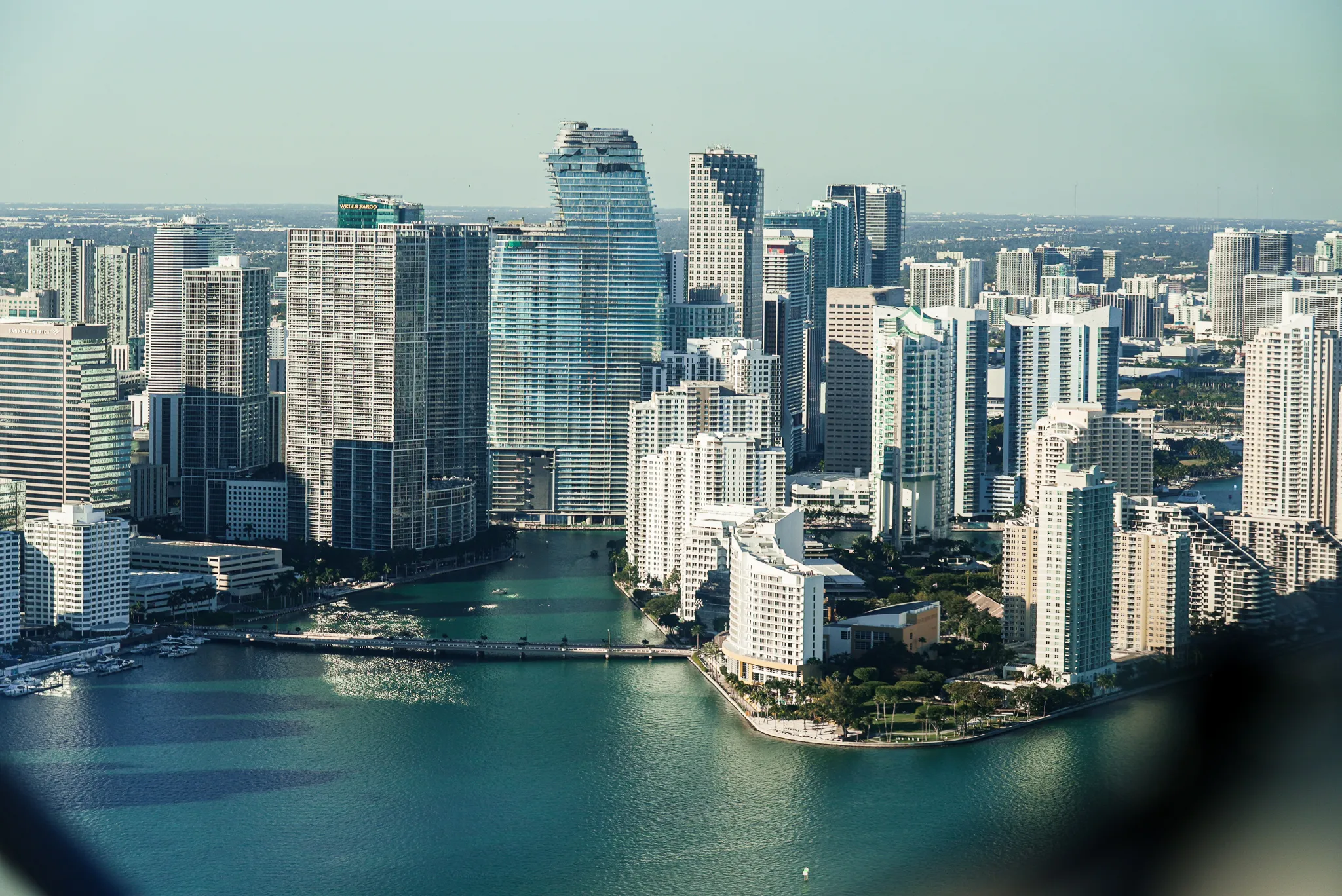 Miami waterfront high-rise skyline seen from an aircraft window