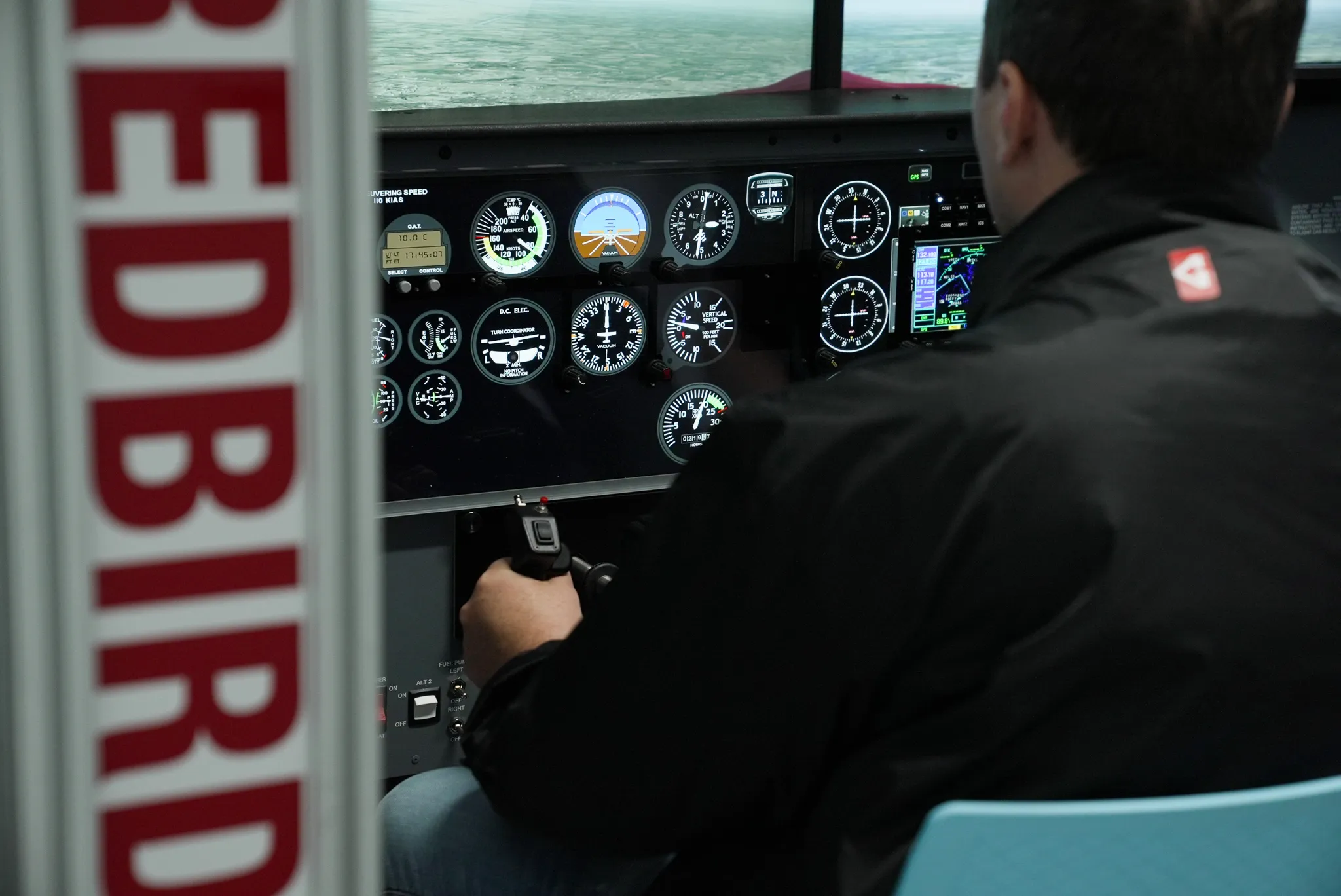 Redbird full-motion flight simulator at Sun City Aviation Academy