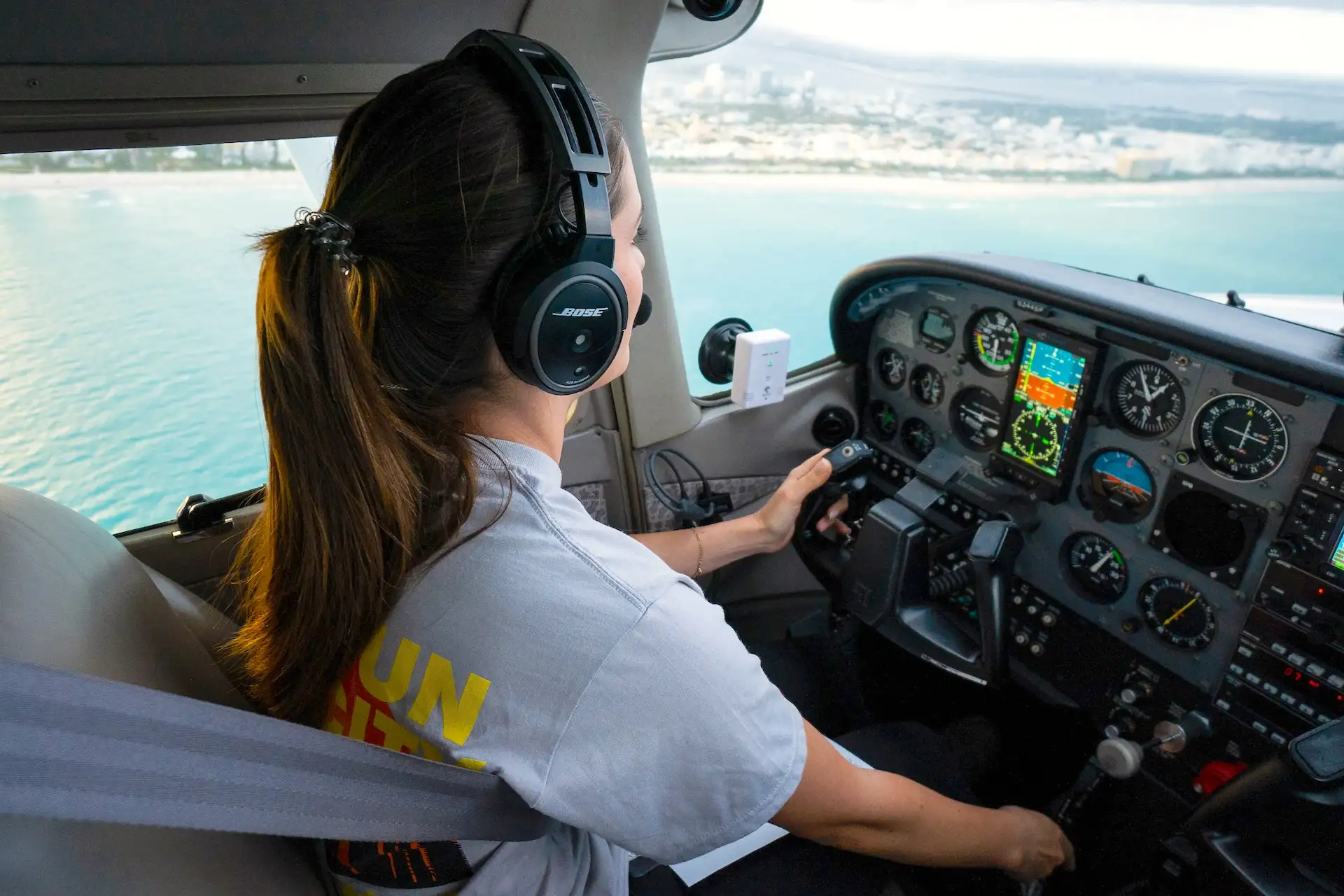 sun city aviation academy student flying over miami