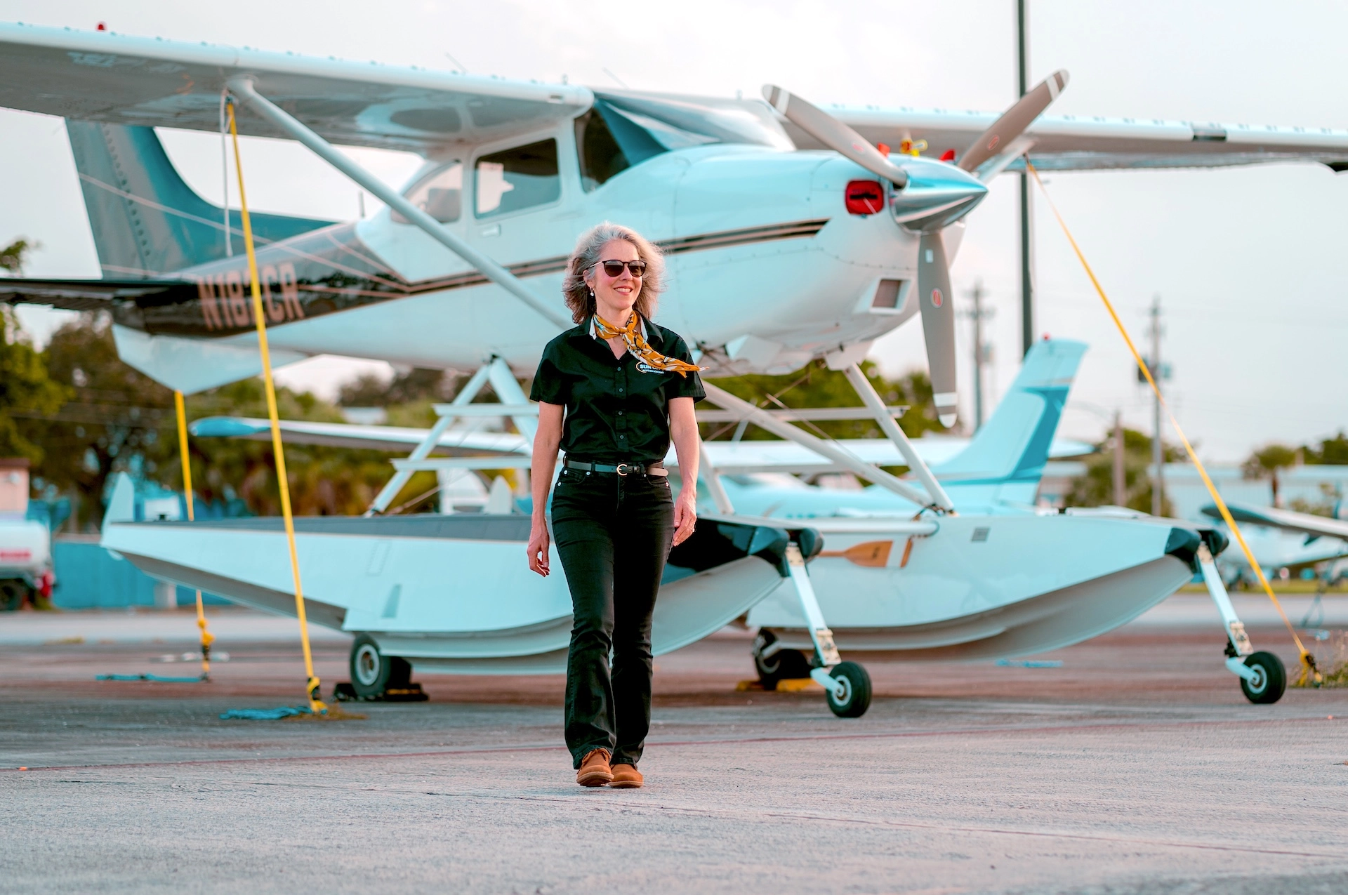 Sun City Aviation Academy student flying a plane over the city of Miami