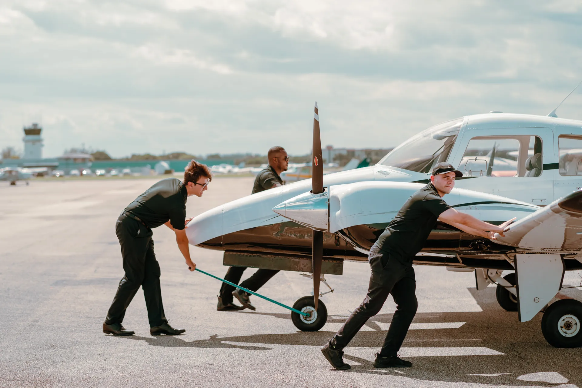 sun city aviation academy cool pilot in front of a plane at the airport