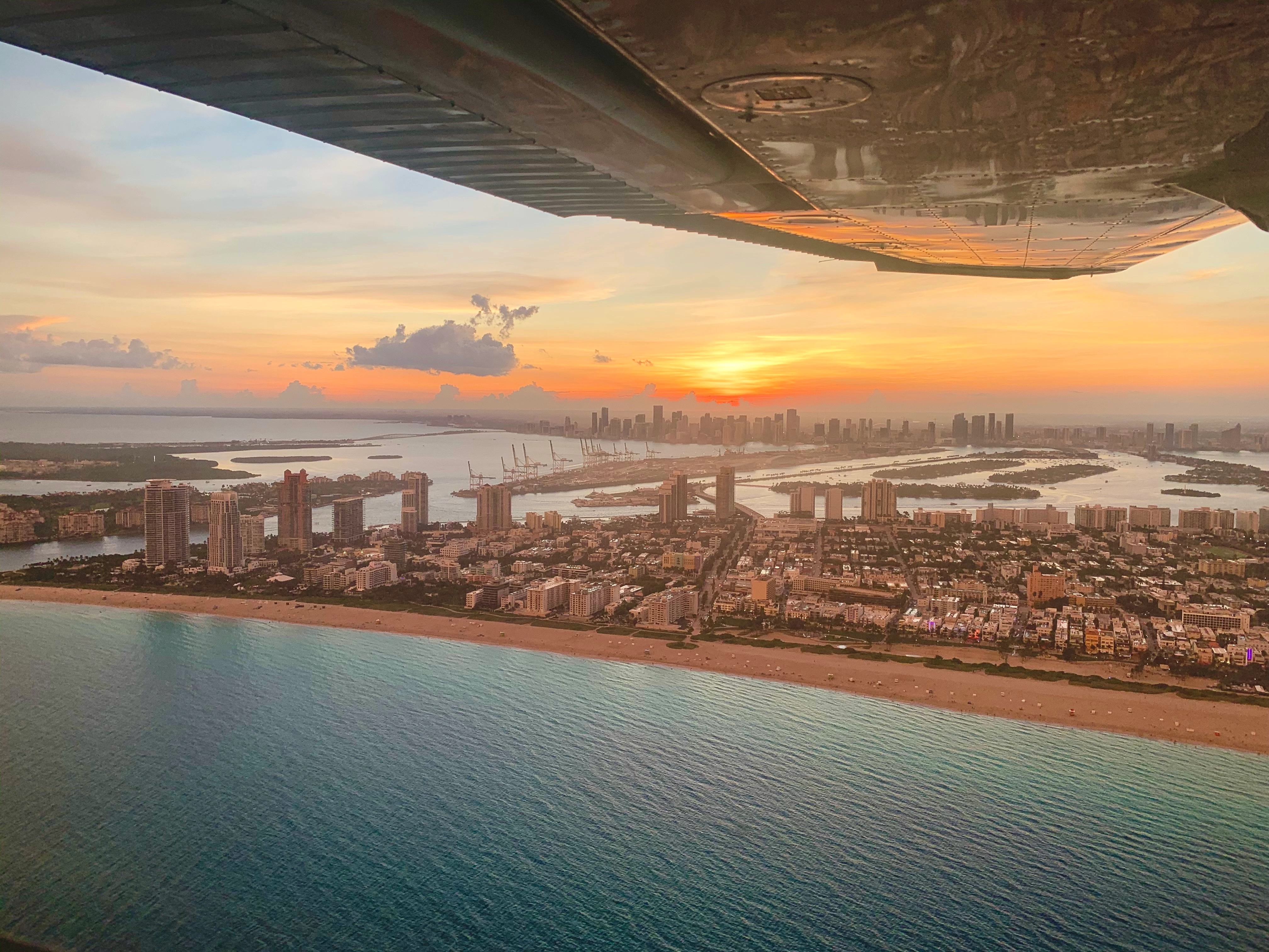 Sun City Aviation Academy airplane flying over Miami