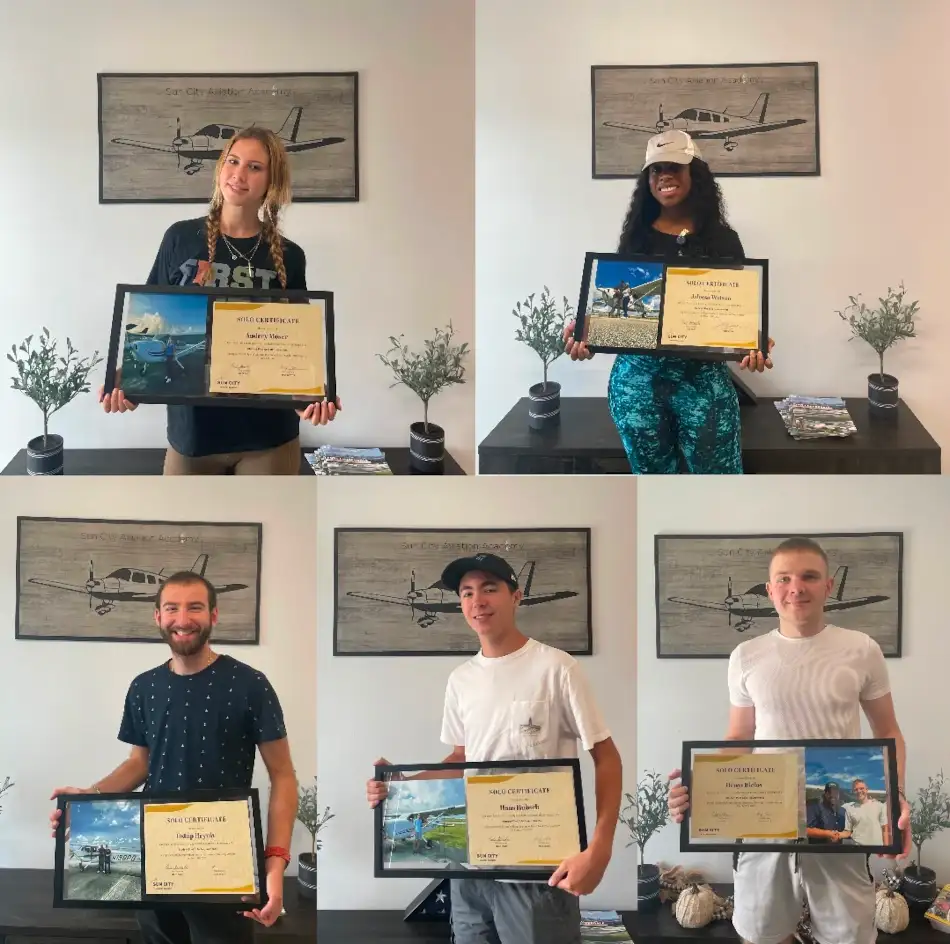sun city aviation students celebrating after passing their checkride