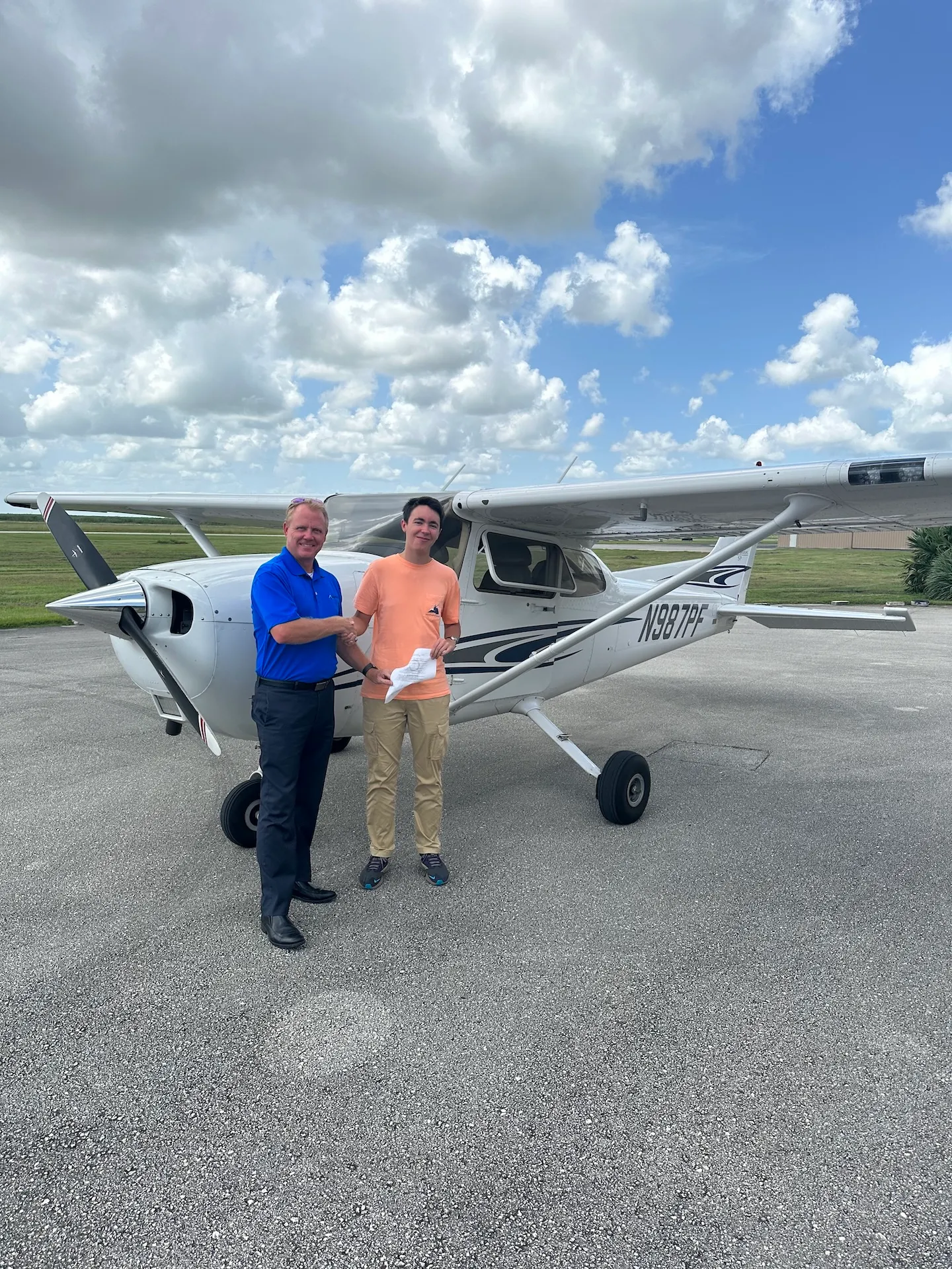 Sun City Aviation student celebrating checkride success