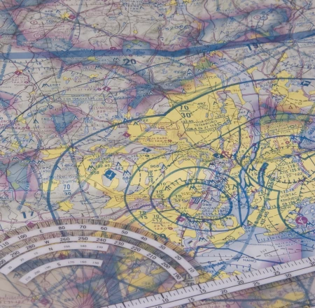 Picture of an aeronautical chart with a plotter