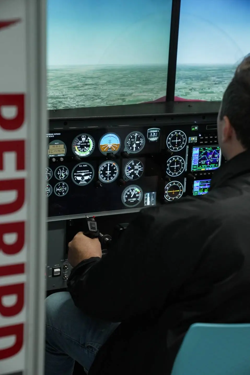 Sun City Aviation pilot student Flying the Redbird Flight Simulator